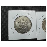 Two 90% Silver Kennedy Half Dollars - 1964 and 1964-D Both Marked AU 50 When Purchased Two 90% Silver Kennedy Half Dollars - 1964 and 1964-D Both Marked AU 50 When Purchased