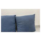 Set of two muted blue decorative pillows