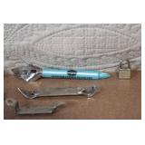 Vintage Beer Openers, Folding Stamps, and Collectible Tool Lot