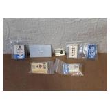 Collection of Vintage Cigarette Paper Packs and Metal Holders