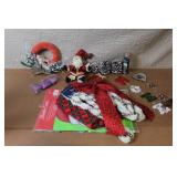 Collection of Christmas Decorations Including Hidden Talents Santa Doll, Wreath, Ornaments, and Pinecones