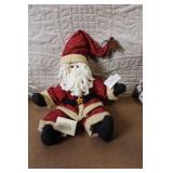 Collection of Christmas Decorations Including Hidden Talents Santa Doll, Wreath, Ornaments, and Pinecones