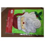 Collection of Christmas Decorations Including Hidden Talents Santa Doll, Wreath, Ornaments, and Pinecones