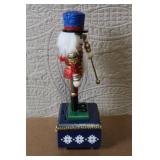 Holiday Nutcracker Marionette Music Box with Blue Hat and Glitter Details