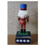Holiday Nutcracker Marionette Music Box with Blue Hat and Glitter Details
