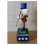 Holiday Nutcracker Marionette Music Box with Blue Hat and Glitter Details