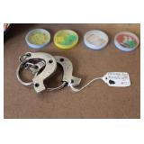 Vintage Toy Collection with Studebaker Badge, Davy Crockett Wallet, and Handcuffs