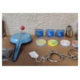 Vintage Toy Collection with Studebaker Badge, Davy Crockett Wallet, and Handcuffs