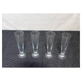 Set of 4 Glass Champagne Flutes with Nutcracker Figurine Collection