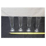 Set of 4 Glass Champagne Flutes with Nutcracker Figurine Collection