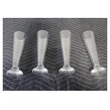Set of 4 Glass Champagne Flutes with Nutcracker Figurine Collection