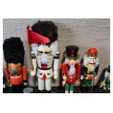 Set of 4 Glass Champagne Flutes with Nutcracker Figurine Collection