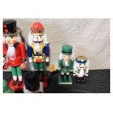 Set of 4 Glass Champagne Flutes with Nutcracker Figurine Collection