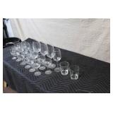 Collection of 23 Assorted Glassware Including Wine, Cocktail, and Tumblers