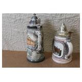 Pair of German Beer Steins with Pewter Lids and City Scenes