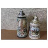 Pair of German Beer Steins with Pewter Lids and City Scenes