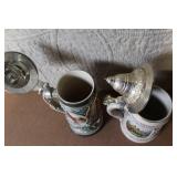 Pair of German Beer Steins with Pewter Lids and City Scenes