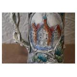 Pair of German Beer Steins with Pewter Lids and City Scenes
