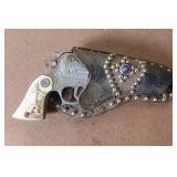 Vintage Western Style Toy Cap Gun with Embossed Leather Holster