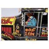 Vintage Tin Wind-Up Old Jalopy Toy Car with Comic Graphics