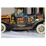 Vintage Tin Wind-Up Old Jalopy Toy Car with Comic Graphics