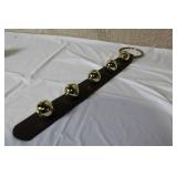 Holiday Decorative Lot with Brass Horn, Sleigh Bells, Candle Holder, and Snowman Bells