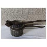 Collection of Vintage Kitchen Utensils and Hand Tools