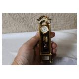 Collection of 3 Miniature Clocks - Bulova Grandfather, Crystal, Delft Porcelain