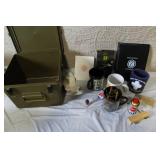 Military Surplus Collection with Ammo Cans, First Aid Kit, Boots, and Memorabilia