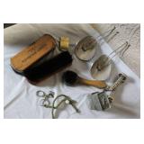 Military Surplus Collection with Ammo Cans, First Aid Kit, Boots, and Memorabilia