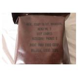 Military Surplus Collection with Ammo Cans, First Aid Kit, Boots, and Memorabilia