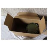 Military Surplus Collection with Ammo Cans, First Aid Kit, Boots, and Memorabilia