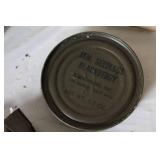 Military Surplus Collection with Ammo Cans, First Aid Kit, Boots, and Memorabilia