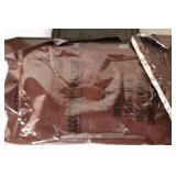 Military Surplus Collection with Ammo Cans, First Aid Kit, Boots, and Memorabilia