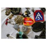 Military Surplus Collection with Ammo Cans, First Aid Kit, Boots, and Memorabilia