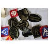 Military Surplus Collection with Ammo Cans, First Aid Kit, Boots, and Memorabilia