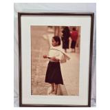 Framed Photograph of a Girl Holding a Tomato and Onion by Minnesota Native Photojournailst Paul Chesley - Approx. 20 1/2" x 26 1/2"