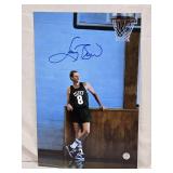 Larry Bird Autographed Basketball Photo with Authentication Sticker