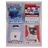 Lot of 4 Blake Lizotte Hockey Cards featuring Rookie, Auto, and Holo. Contains cards from sets including Ice Premieres 9/399 and Credentials 1/65
