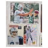 Lot of 5 Football Cards Featuring Troy Aikman Finest, Brett Favre, Dan Marino, and Derek Carr. Includes holographic and vintage styles.
