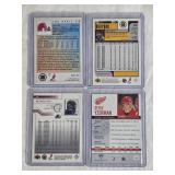 Lot of 4 Hockey Cards Featuring Ray Bourque, Steve Yzerman, Joe Sakic, and Patrick Roy.