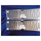 Two Cape line pressed tin signs