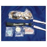 Lot of keychains, bottle openers and sunglasses