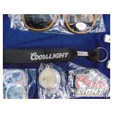 Lot of keychains, bottle openers and sunglasses