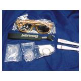 Lot of keychains, bottle openers and sunglasses