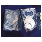 Lot of keychains, bottle openers and sunglasses