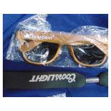 Lot of keychains, bottle openers and sunglasses