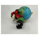 Midwest Importers Santa with the World on his Shoulders.