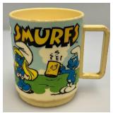 Vintage Collectible Cups Including Smurfs, Yogi bear And More Vintage Collectible Cups Including Smurfs, Yogi bear And More