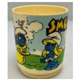 Vintage Collectible Cups Including Smurfs, Yogi bear And More Vintage Collectible Cups Including Smurfs, Yogi bear And More